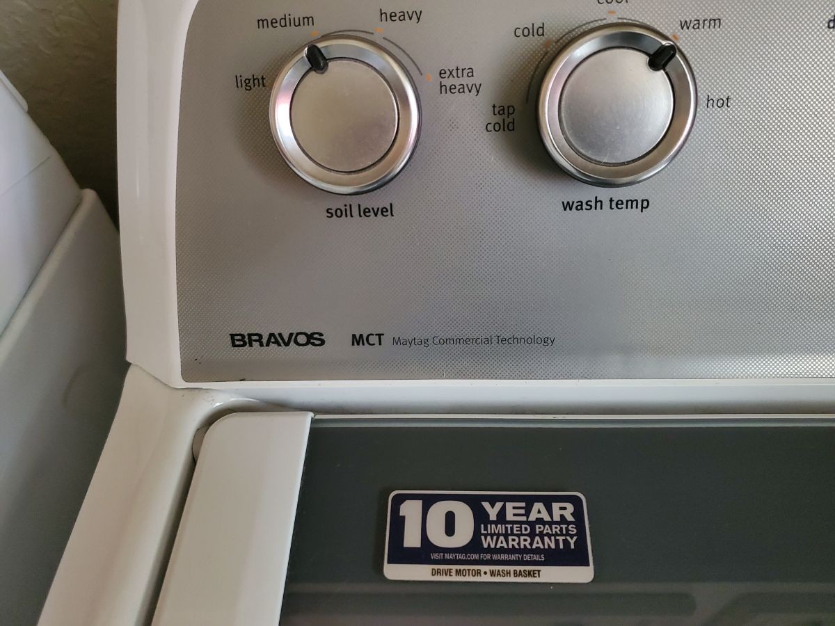 Top load washer and gas dryer