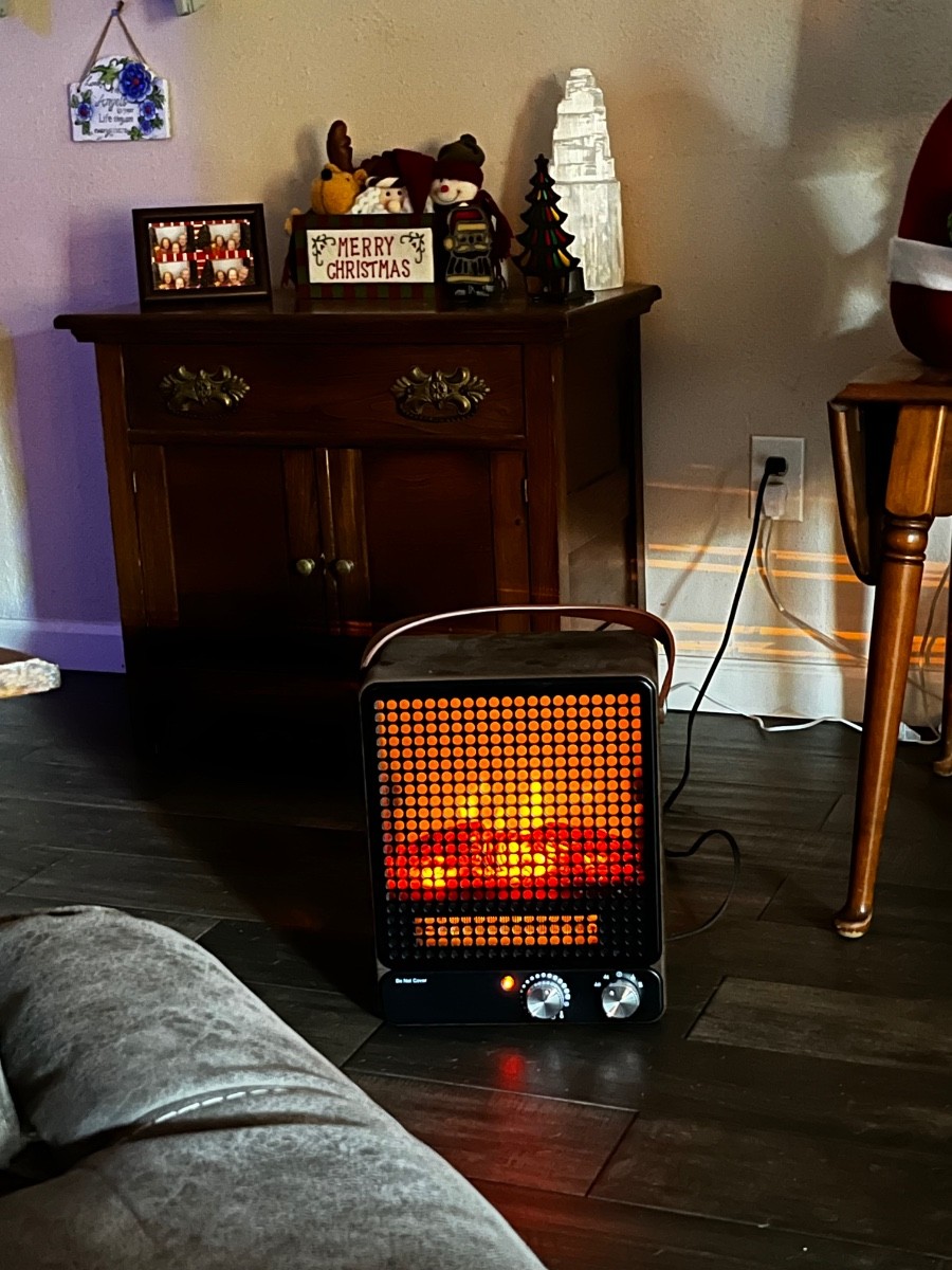 I have my fireplace on this morning lol . Isn't it cute ? More f