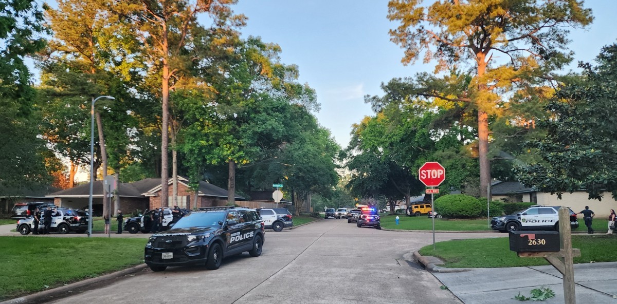 Stand off at a house lots of cops in Sherwood Trails.
